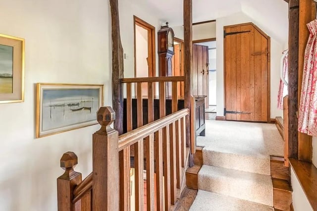 The house also features an elegant staircase leading up to the bedrooms. Picture: Jackson-Stops Lindfield. SUS-210411-115917001