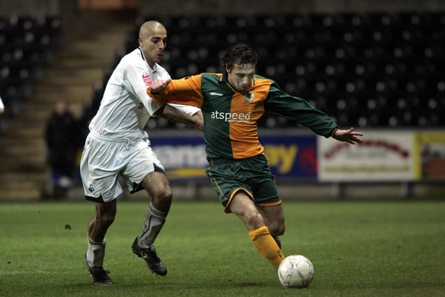 Action from Horsham's second round replay at Swansea City