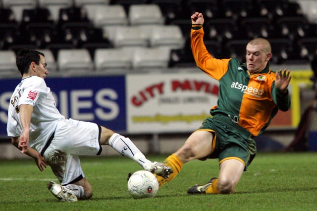 Action from Horsham's second round replay at Swansea City