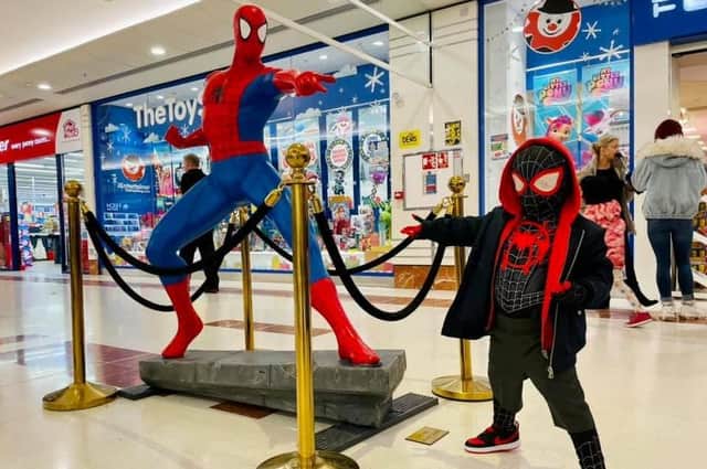 A young Spiderman was excited to see Spiderman
