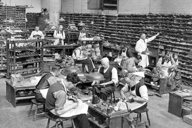 circa 1950: Shoemakers at work in the hand-sewing room helping with post-war trade at Sticklands, Northampton. (Photo by Fox Photos/Getty Images)
