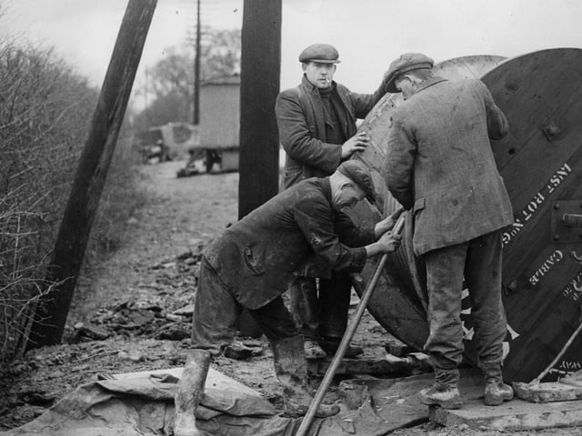 23rd February 1936: Post Office engineers in Northampton laying Britain's first television cable. (Photo by Arthur Tanner/Fox Photos/Getty Images)