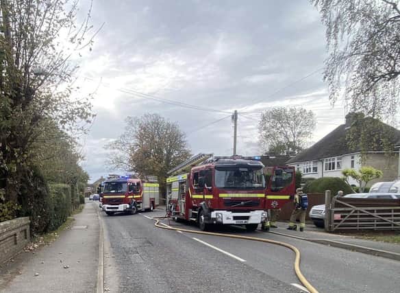 Firefighters at the scene in Hailsham SUS-210611-114254001