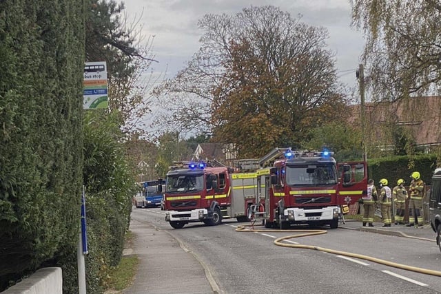 Firefighters at the scene in Hailsham SUS-210611-114314001