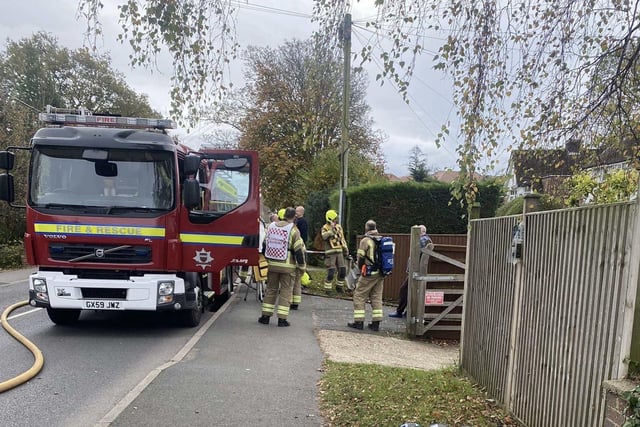 Firefighters at the scene in Hailsham SUS-210611-114334001