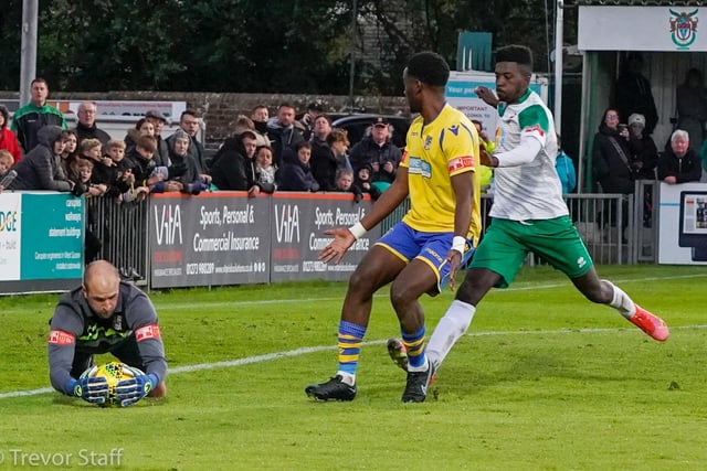 Action from the Rocks' draw with Kingstonian at Nyewood Lane / Pictures: Lyn Phillips and Trevor Staff