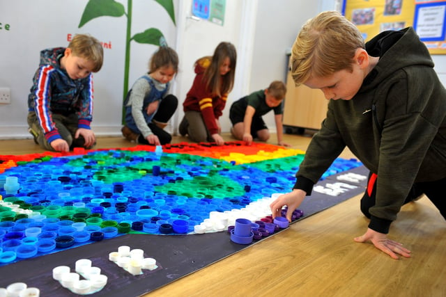 Year three pupils working on the collaborative art piece. Picture: Steve Robards SR2111051