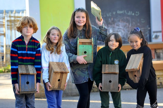 Pupils from years five and six with the bird boxes the school has made. Picture: Steve Robards SR2111051