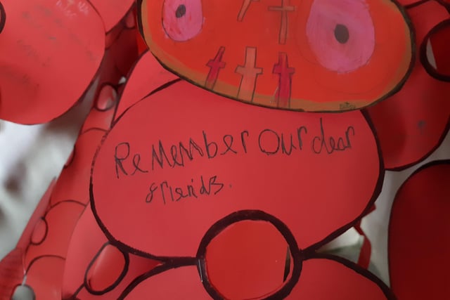 Pupils of Arundel Church of England school wrote little messages on the poppies and doves to remember those who fought in the war
