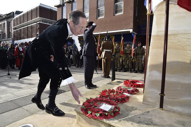 Remembrance Sunday in Peterborough City Centre.  High Sheriff Neil McKittrick laying wreath EMN-191011-212838009