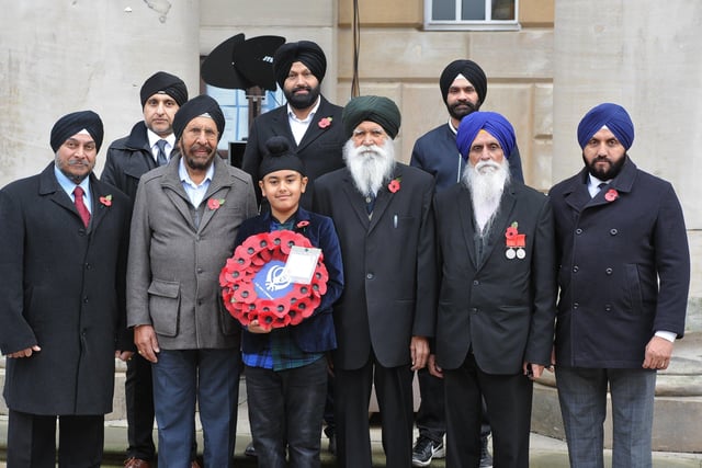 Remembrance Sunday in Peterborough City Centre. Sikhs who laid a wreath at the memorial. EMN-191011-212211009