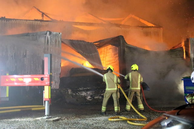 Fire crews battle the blaze at an industrial unit in Station Road, Loxwood