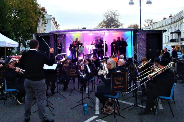 The Royal Spa Brass and the Baptist Music Group perform at the switch-on of the Rotary Club of Royal Leamington Spa's tree of light in Leamington.