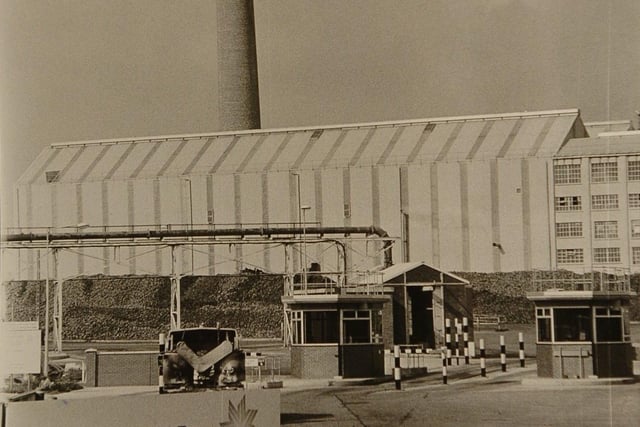 The site entrance with the iconic chimney.