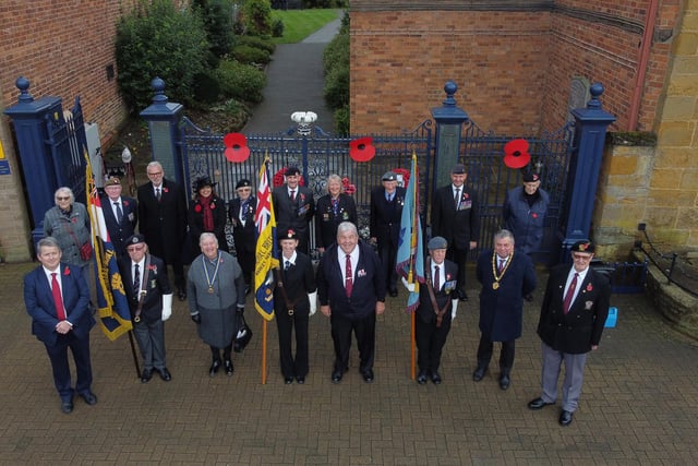 Outside the memorial gates during Remembrance service on the Square.