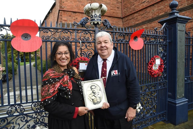 Sheila Caberwal holds a picture of her late father Jagat Caberwal who served with Captain Tom with Stewart Harrison.