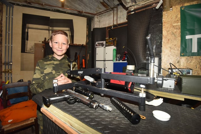 Outdoorsman Supplies in Hastings.

11 year old Wiktor Blonski having a lesson under the strict supervision of range officer Alistair Robertson. SUS-210611-131614001
