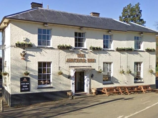 A busy inn over looking a medieval bridge with an extensive range of beers and good home-cooked food.