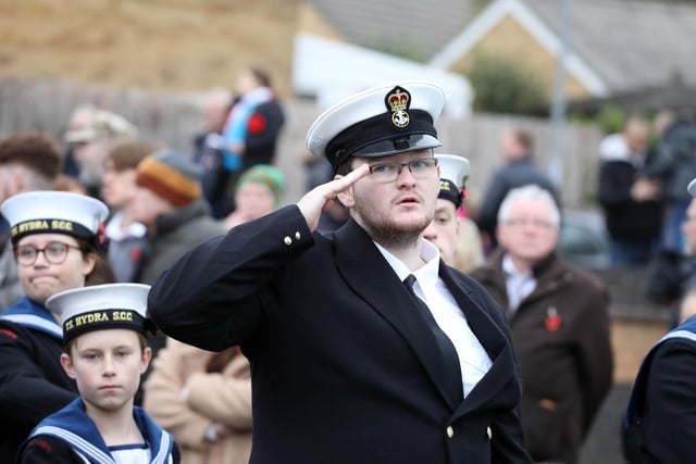 Eyes right - saluting the memorial Sea Cadets