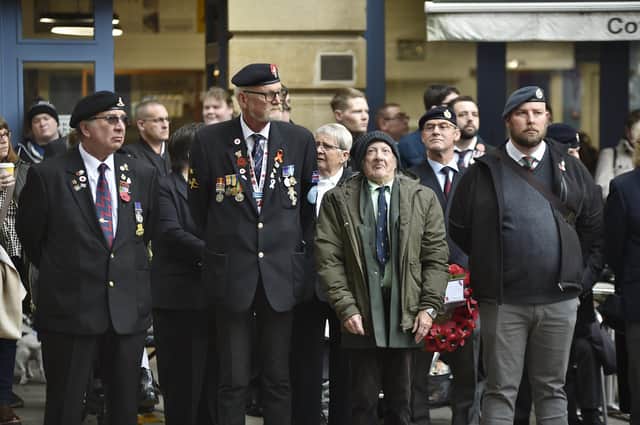 Remembrance Sunday parade and service  at  the War memorial Bridge Street EMN-211114-133202009