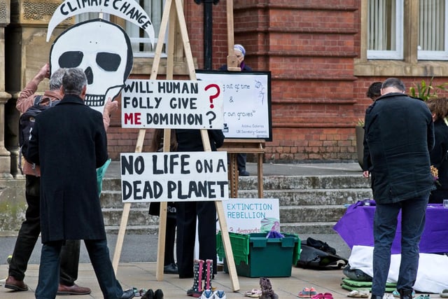 Extinction Rebellion activists staged a 'die-in' at Leamington Town Hall on Saturday November 13, highlighting their disappointment at the COP26 climate change summit, which came to an end in Glasgow on the same day.