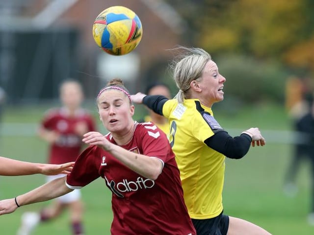 Leah Cudone goes up for a header.
