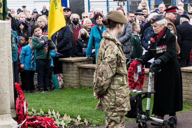 Veterans and the Community of Bexhill during the Service of Remembrance at the War Memorial, Bexhill, East Sussex, UK on November 14 2021. Lee Floyd SUS-211116-104333001