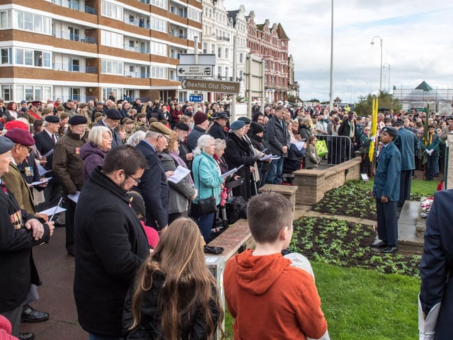 Veterans and the Community of Bexhill during the Service of Remembrance at the War Memorial, Bexhill, East Sussex, UK on November 14 2021. Lee Floyd SUS-211116-103914001