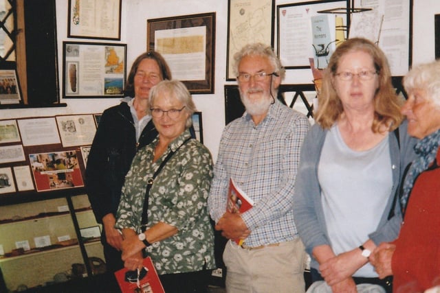A small group of Sussex Archaeological Society members, led by president Professor Martin Bell, paid an autumn visit to Pevensey where the society’s first general meeting was held 175 years ago.  Following a special tour of Pevensey Castle they were welcomed to the Court House Museum (visited as the Town Hall in 1846) by the hon curator, Peter Harrison. Pictured here are members in the Court Room, which included a 175th anniversary display. SUS-211117-115429001