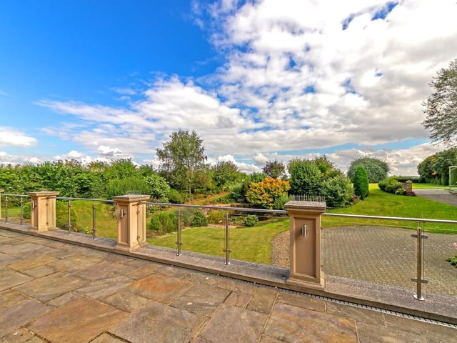 This five-bed property has an array of leisure facilities and an extensive garden all for 1.75 million.