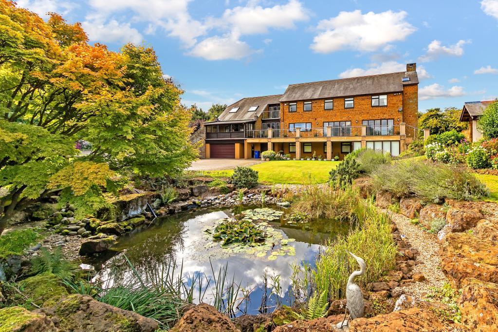 This five-bed property has an array of leisure facilities and an extensive garden all for 1.75 million.