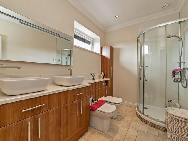 This five-bed property has an array of leisure facilities and an extensive garden all for 1.75 million.