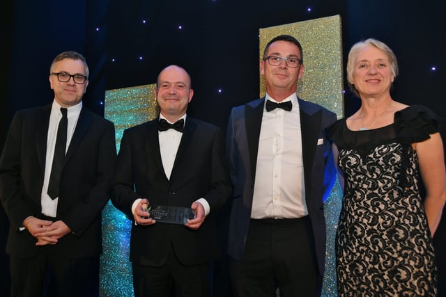 Peterborough Telegraph Business Excellence Awards 2021. Medium  Business of the Year winner Dark Engineering , sponsor Mark East and Ann Daniels. EMN-211120-003831009