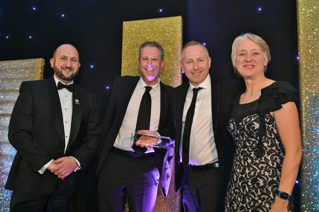 Peterborough Telegraph Business Excellence Awards 2021. Large   Business of the Year winner Whirlpool Appliances  with sponsor Matthew Pudney and Ann Daniels. EMN-211120-003519009