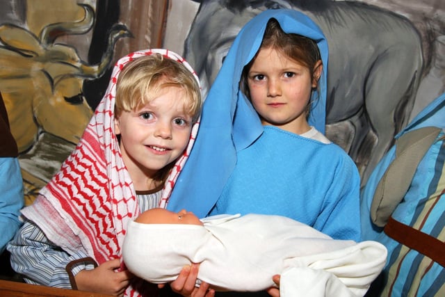 DM21110930a.jpg. Littlehampton Christmas lights switch on event. Nativity scene, Holly Fitzpatrick as Mary and Skye Weedon as Joseph. Photo by Derek Martin Photography and Art. SUS-211120-082053008
