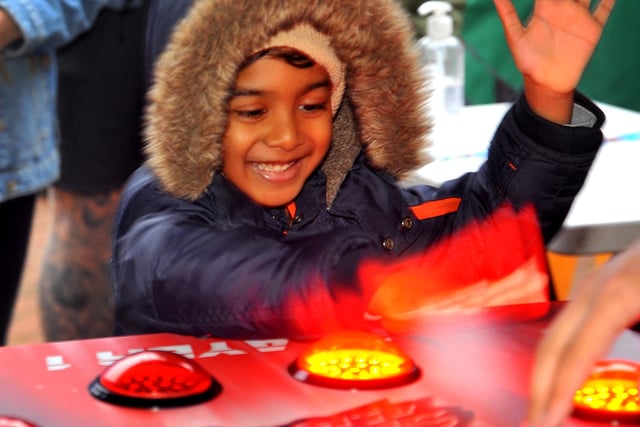 Kids enjoy the various games at It's Christmas in Burgess Hill. Picture: Steve Robards, SR2111211.