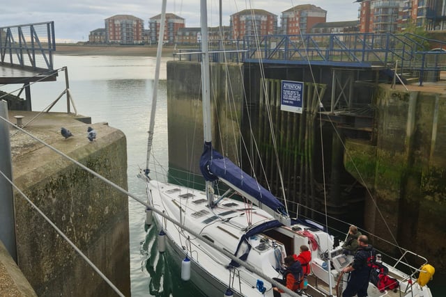 Yacht leaving the lock at Sovereign Harbour, taken by Stella Lockyer. SUS-211122-105749001