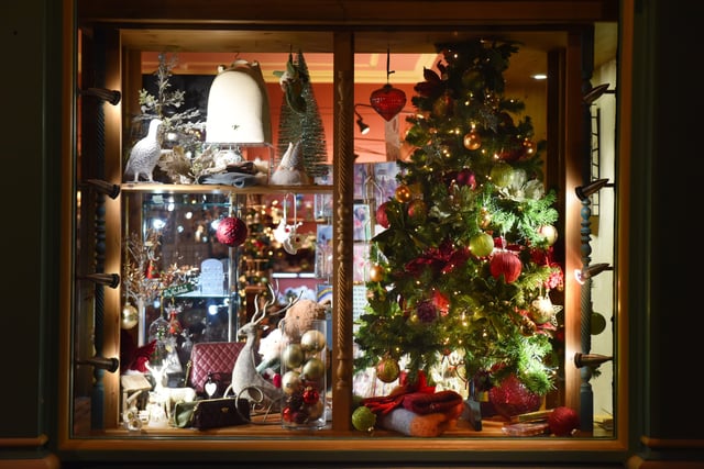 Hastings town centre's Christmas decorations. 20/11/21.

Warterfalls' Christmas window display. SUS-211121-091049001