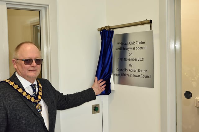 Whitnash mayor Cllr Adrian Barton unveils the plaque for the opening of the new Whitnash Civic Centre and Library.