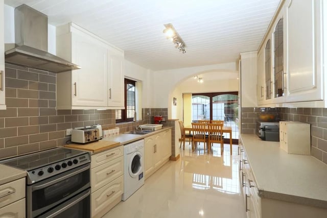 The kitchen/breakfast room has an excellent range of matching base and eye level units, space for oven range with extractor hood above and space for washing appliances