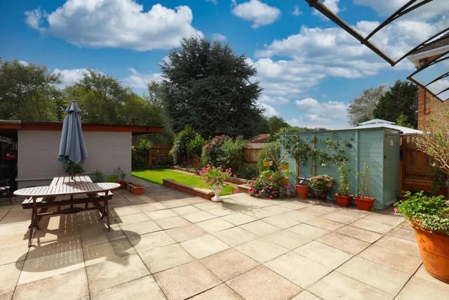 The enclosed rear garden has a lawn but also a sizeable patio/seating area ideal for outdoor entertaining