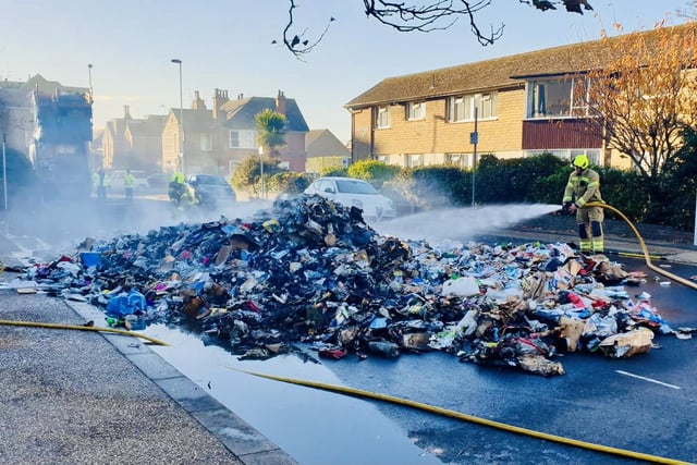 The contents of a refuse lorry was dumped into Christchurch road to prevent the whole vehicle going up in flames