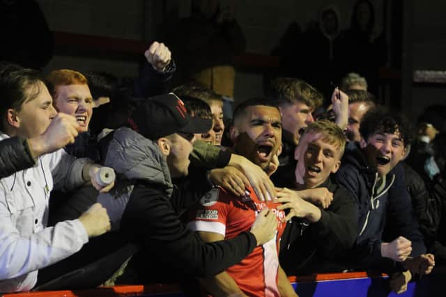Kwesi Appiah celebrates with the fans. Crawley Town v Newport County - picture by Cory Pickford SUS-211124-095727004
