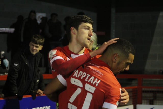 Ashley Nadesan and Kwesi Appiah celebrates. Crawley Town v Newport County - picture by Cory Pickford SUS-211124-095739004