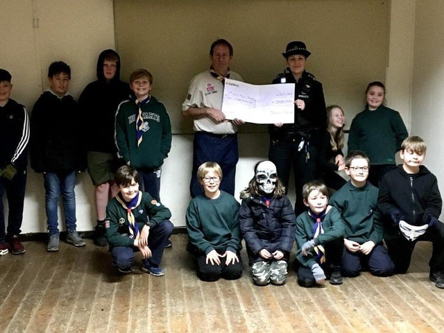 1st Old Town Scout group have been given a cheque for £500 by Eastbourne Police, from the Sussex Police Property Act Fund, which they plan to use to pay for the maintenance and repair of their large canvas tents. Group Scout Leader Mike Standen was delighted with the donation and said that as one of the few remaining groups to use the traditional tents he was pleased the group could now pay to have them properly cleaned, repaired and weather-proofed. SUS-211124-130011001