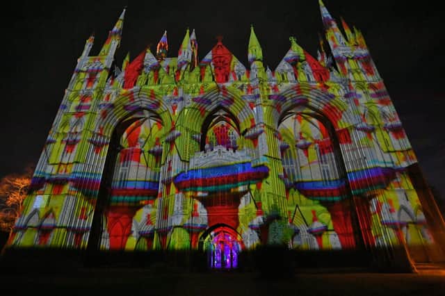 The Angels Are Coming light show at Peterborough Cathedral. EMN-211124-202406009