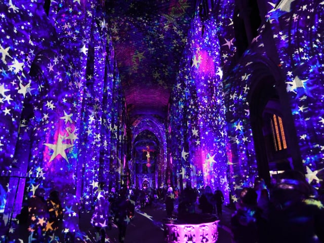 The Angels Are Coming light show at Peterborough Cathedral. EMN-211124-202406009