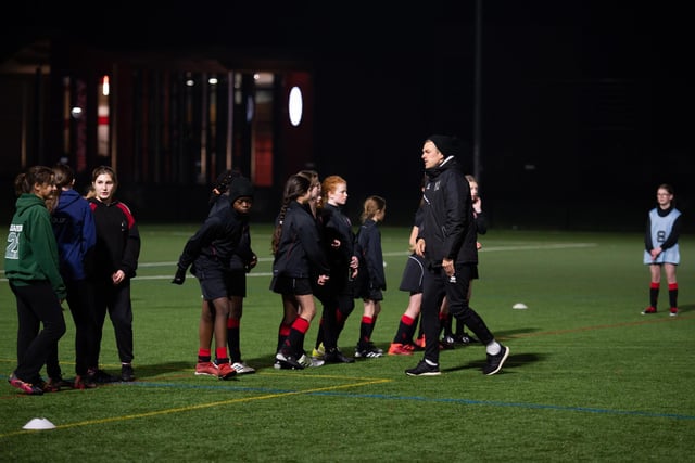 MK Dons coach a girls' football session