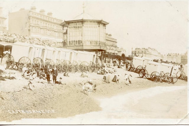 Eastbourne beach showing bathing machines and birdcage bandstand SUS-140304-105323001