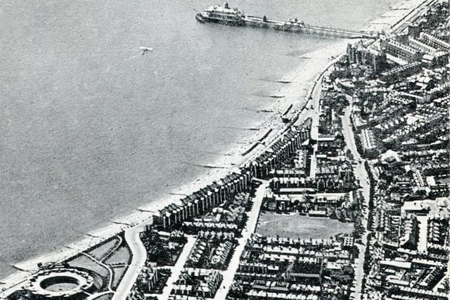 Eastbourne from the air showing the pier and the Redoubt. This is an unusual photograph showing the Redoubt Gardens before the Pavilion Tearooms were built. The Pavilion is now home to the Eastbourne Ancestors exhibition open seven days a week until November 2014. SUS-140304-105333001